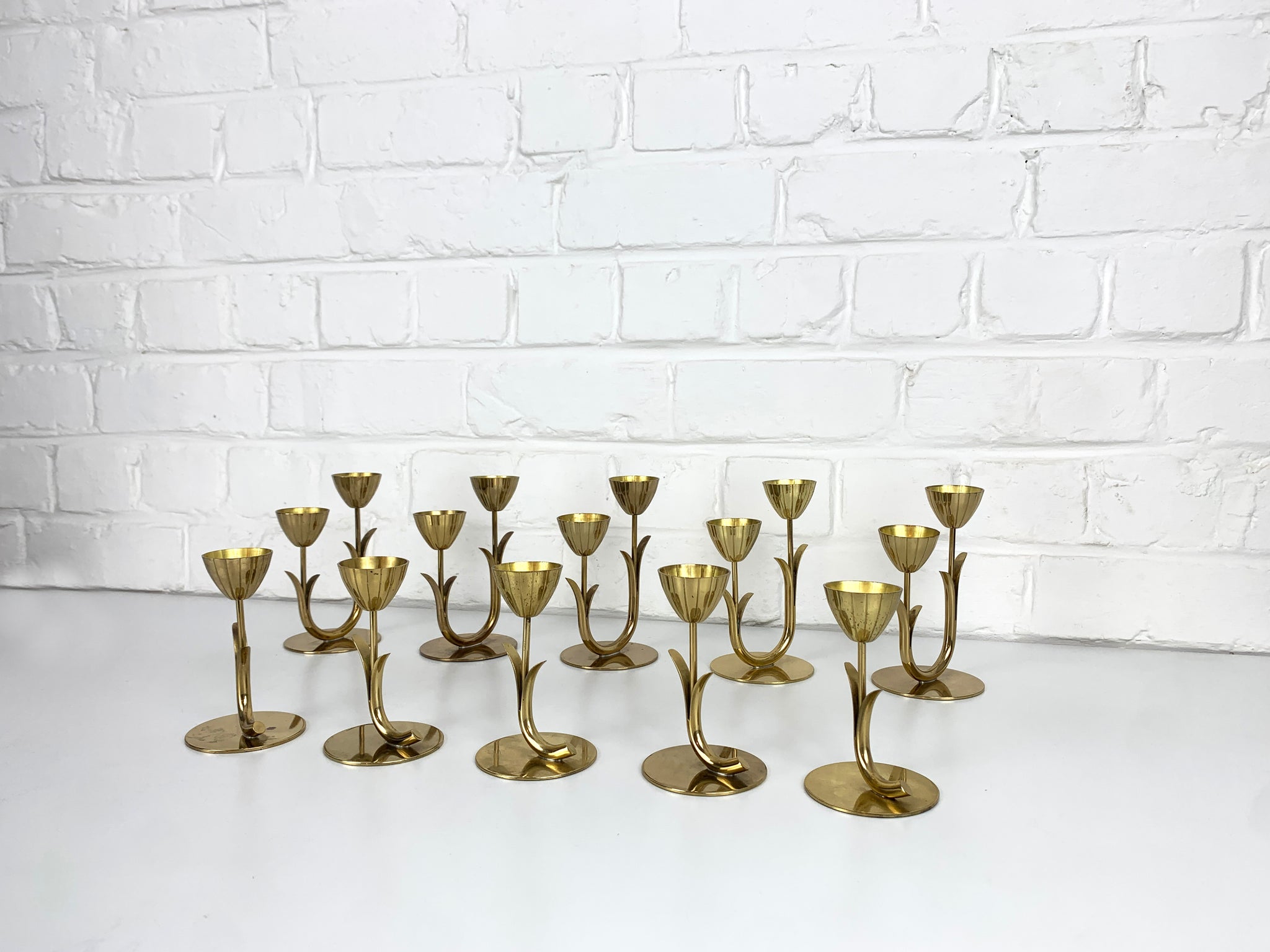 Set of 10 Brass Scandinavian Candlesticks by Gunnar Ander, Ystad Metall Sweden 1950
