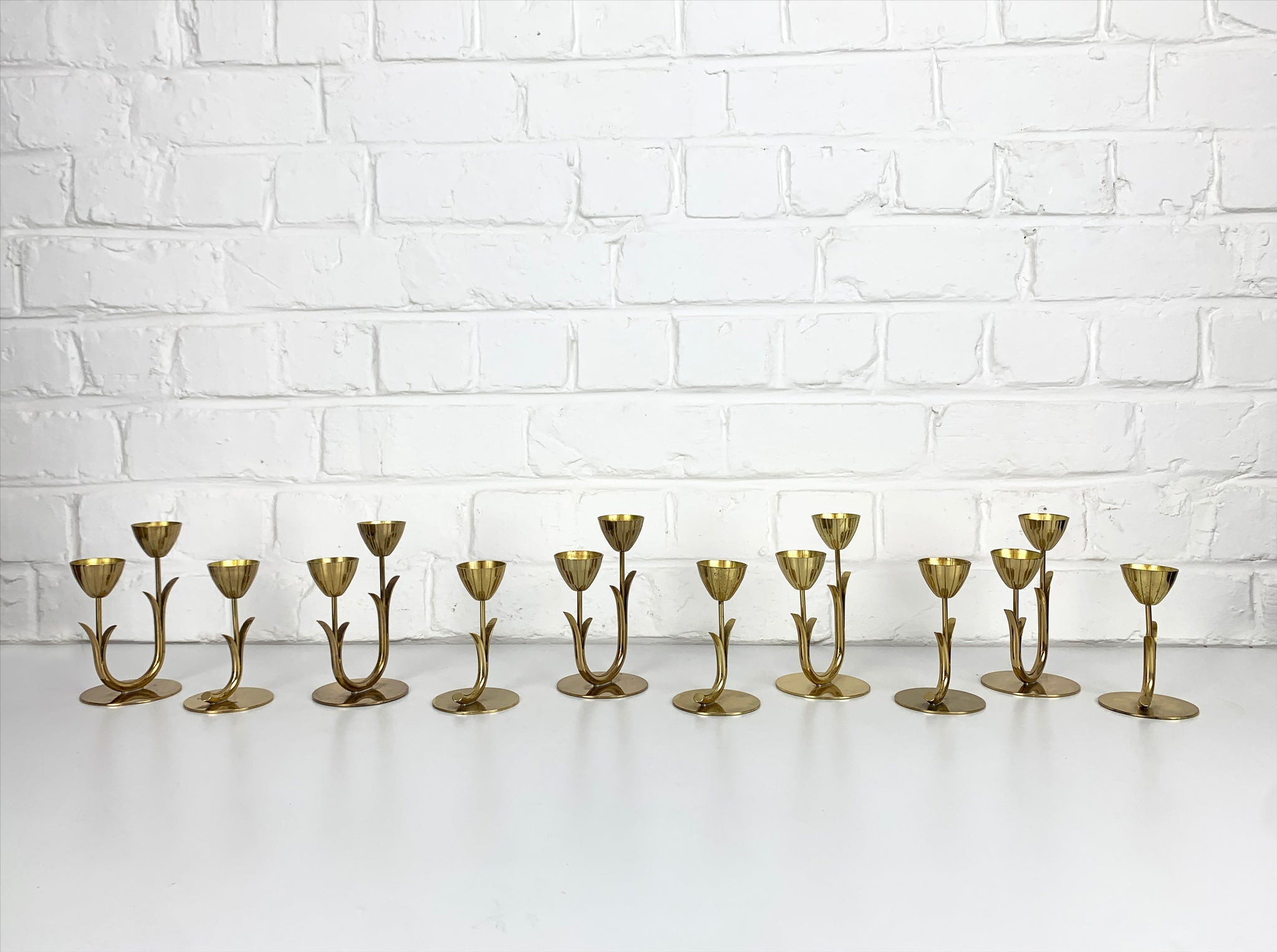 Set of 10 Brass Scandinavian Candlesticks by Gunnar Ander, Ystad Metall Sweden 1950