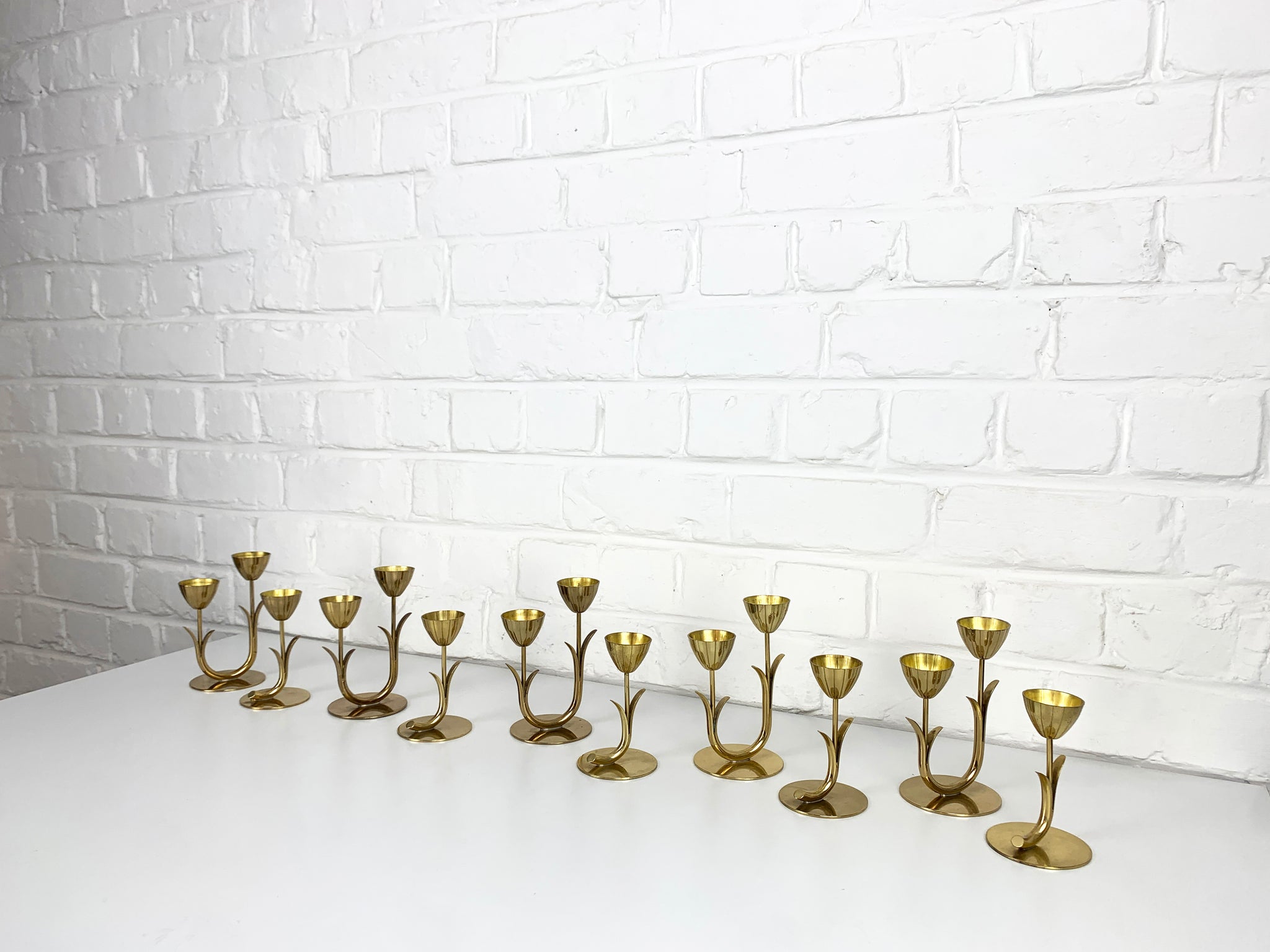 Set of 10 Brass Scandinavian Candlesticks by Gunnar Ander, Ystad Metall Sweden 1950