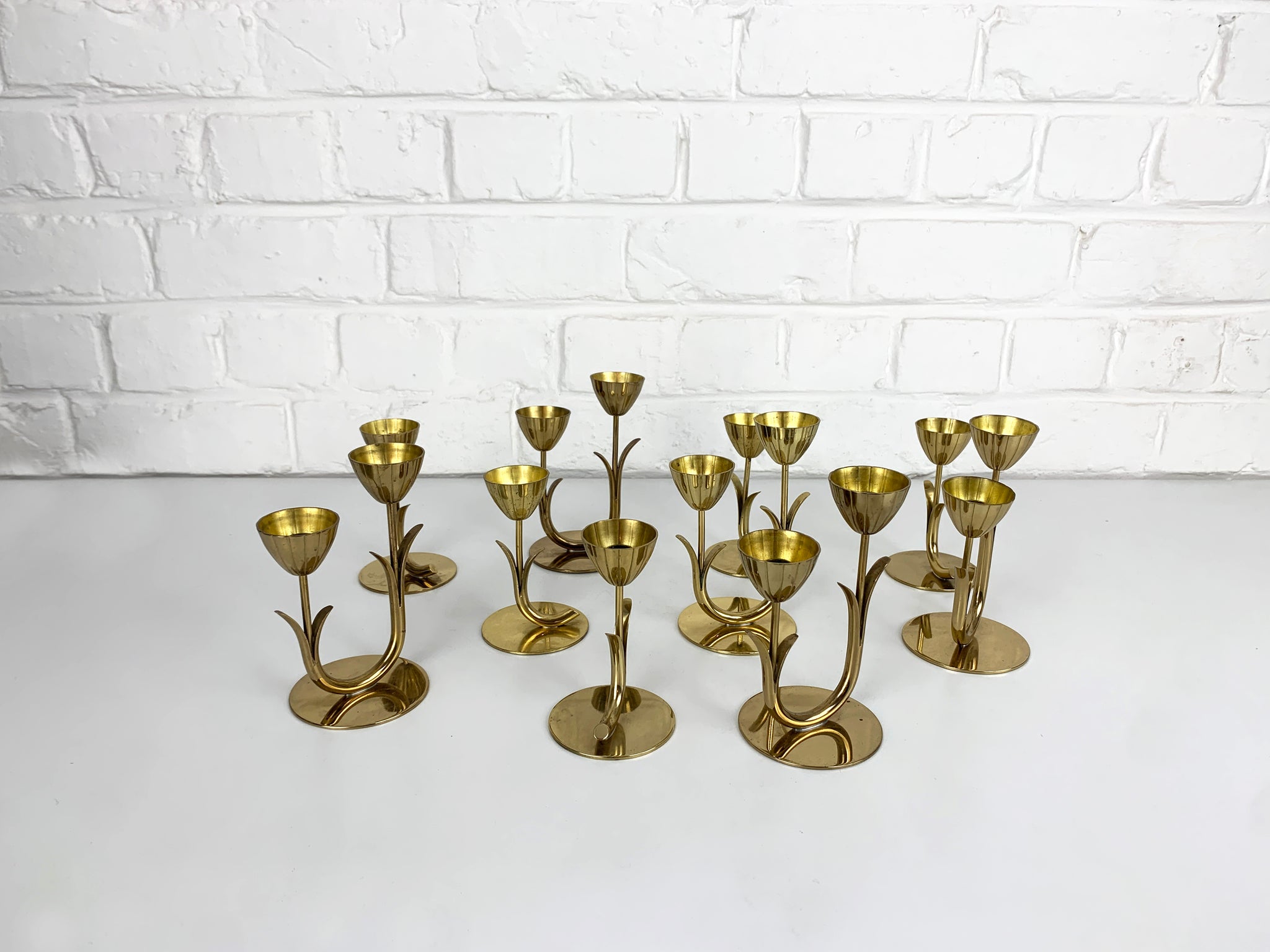 Set of 10 Brass Scandinavian Candlesticks by Gunnar Ander, Ystad Metall Sweden 1950