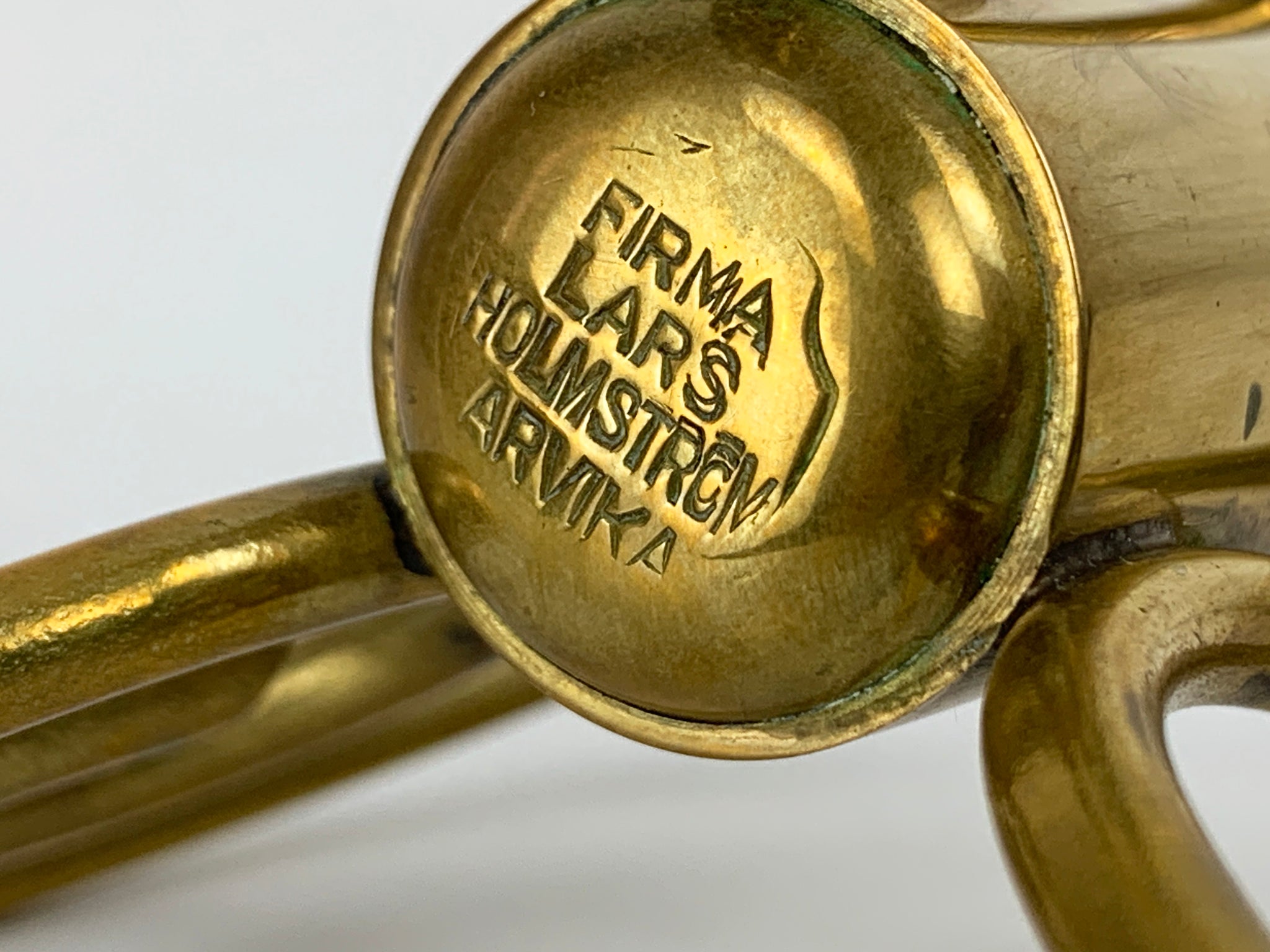 Pair of Swedish Modern Brass candle-sticks by Lars Holmström for Svenskt Tenn, Sweden, 1950