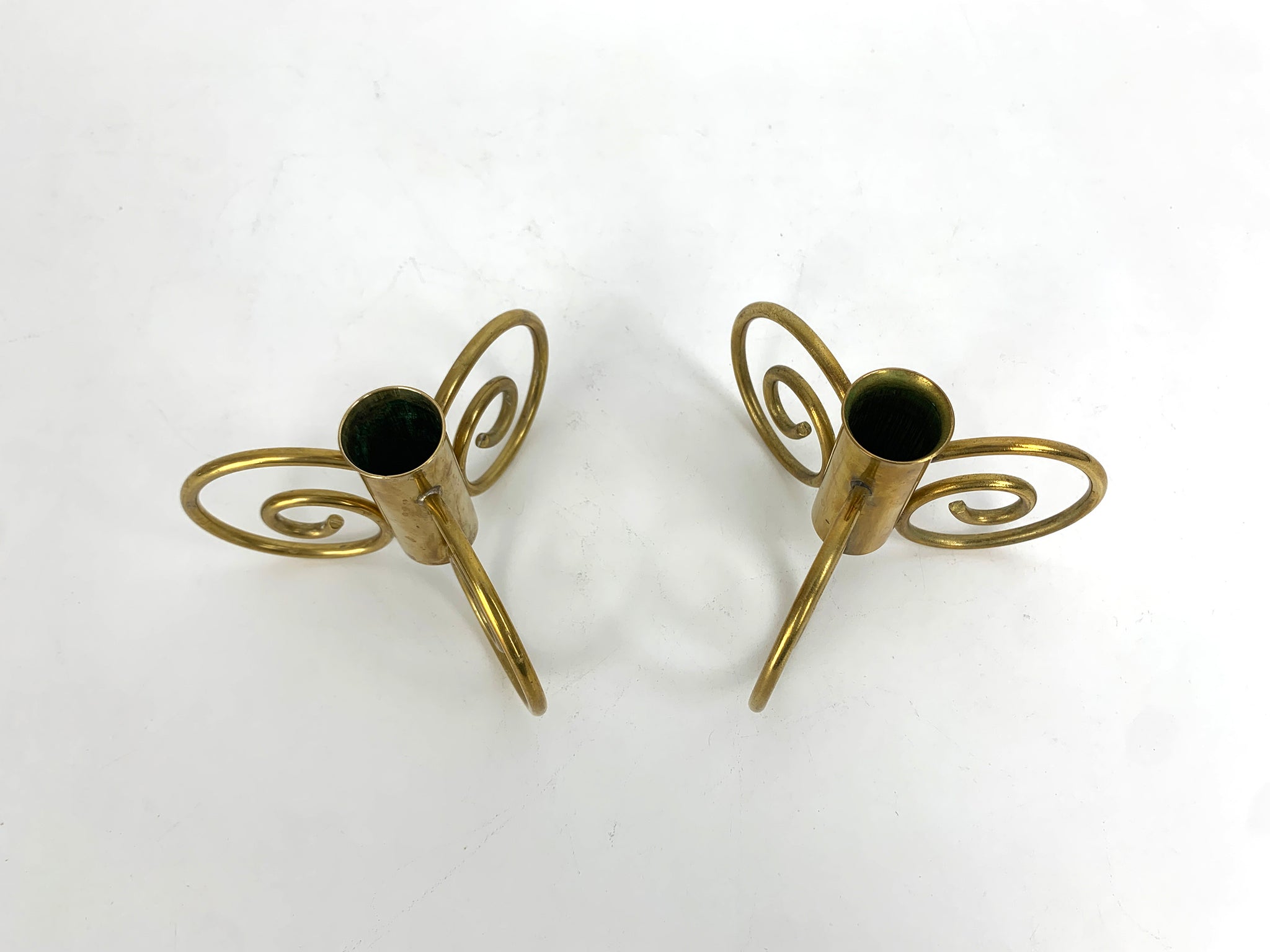 Pair of Swedish Modern Brass candle-sticks by Lars Holmström for Svenskt Tenn, Sweden, 1950