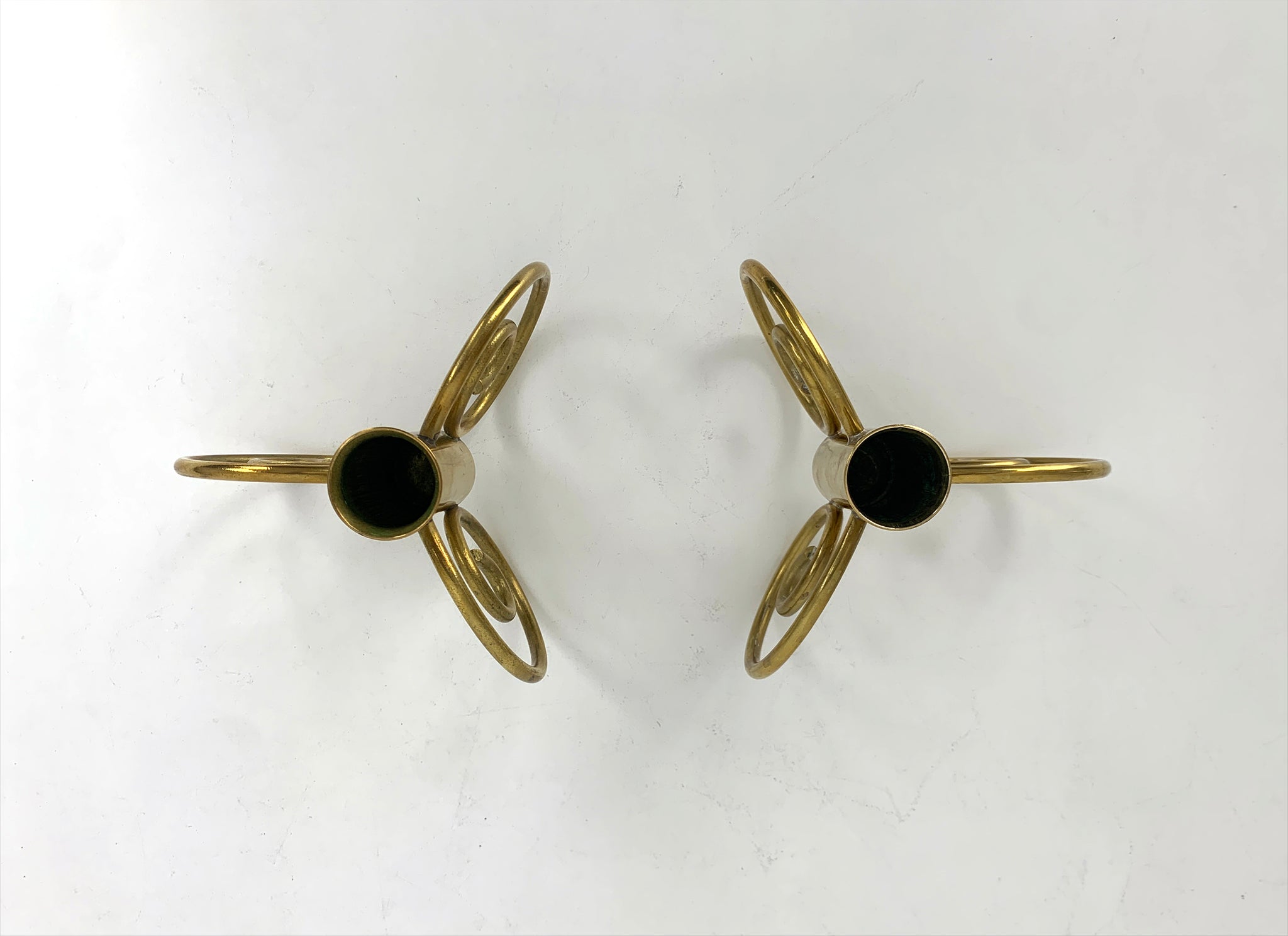 Pair of Swedish Modern Brass candle-sticks by Lars Holmström for Svenskt Tenn, Sweden, 1950